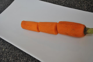 1. Peel your carrot and slice it in two-inch segments